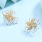Brincos de flor de lótus em dois tons com cristais Swarovski