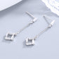 Brincos de prata esterlina com pingente de baguete e cristal Swarovski