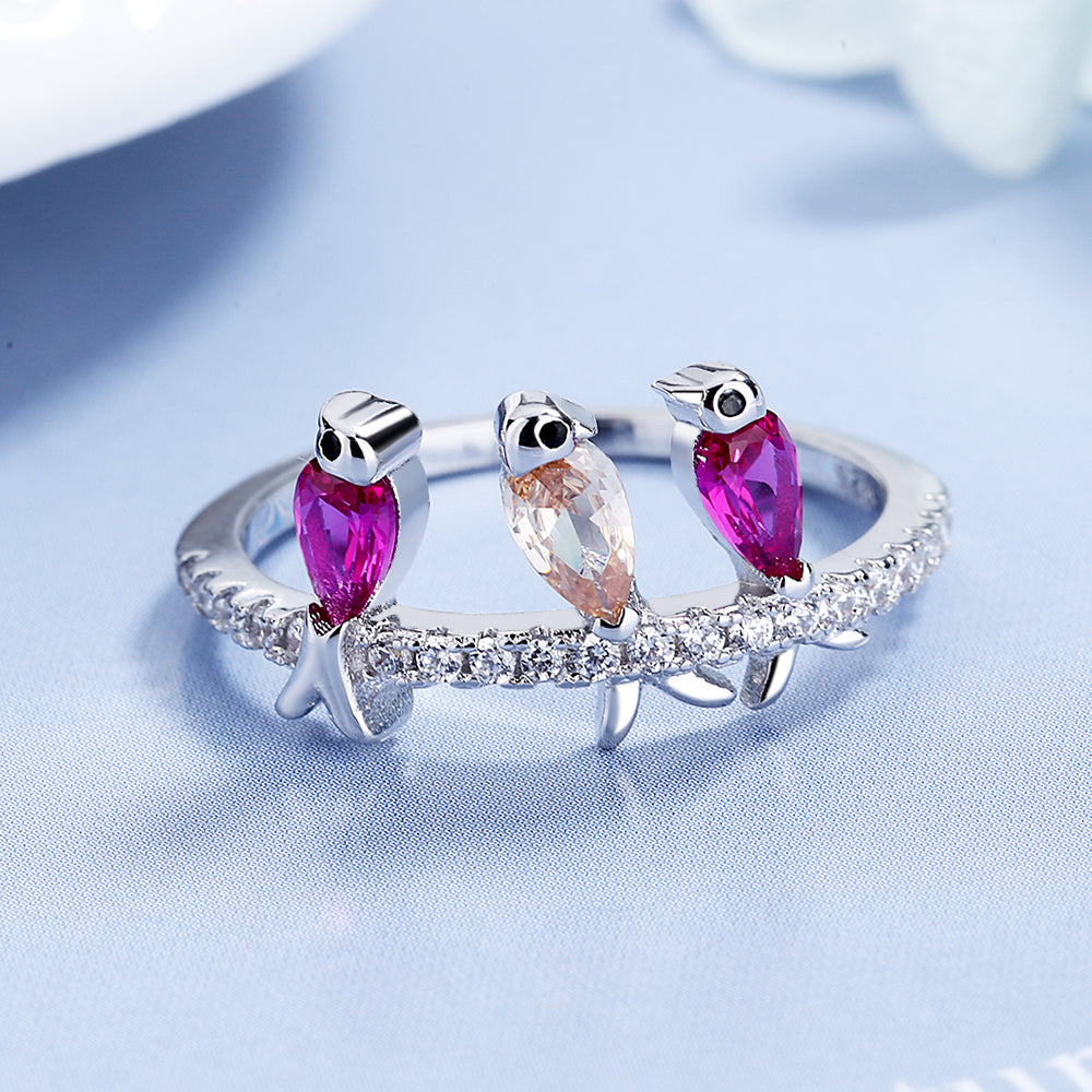 Pássaros empoleirados em prata de lei com cristais Swarovski