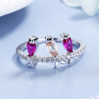 Pássaros empoleirados em prata de lei com cristais Swarovski