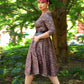 Priscilla Swing Dress in Gold and Black Medallions Print Stretch Twill | Laura Byrnes & Hope Johnstun