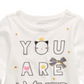 Camiseta de algodão com estampa gráfica e manga comprida First Impressions para bebês meninas, tamanho 3-6 meses