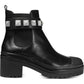 Botas femininas Michael Kors Glenn de couro com sola de couro pretas, tamanho 5M