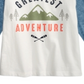 Camiseta infantil First Impressions Baby Boy, de algodão, com estampa gráfica raglan e blocos de cores, branca, tamanho 6 a 9 meses