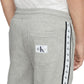 Calça de moletom Calvin Klein masculina com listras e logotipo cinza, tamanho 24