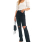 Calça jeans feminina reta e desfiada Free People, preta, tamanho 29