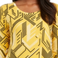 Blusa feminina estampada com manga 3/4 e decote redondo, tamanho P, amarela, da coleção JM