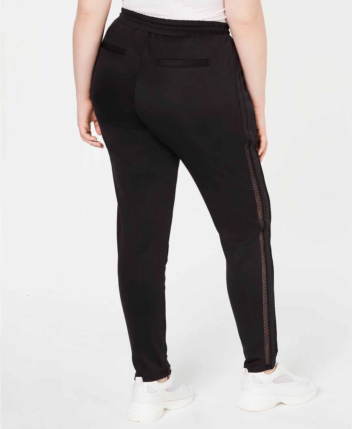 Calça jogger feminina Lala Anthony plus size listrada em malha preta tamanho 2X