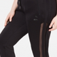 Calça jogger feminina Lala Anthony plus size listrada em malha preta tamanho 2X