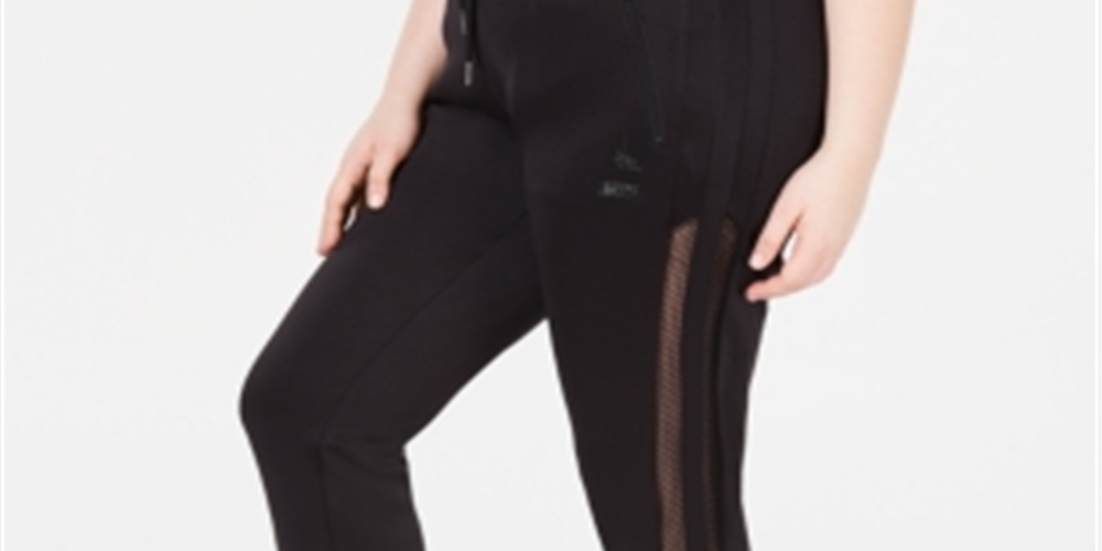 Calça jogger feminina Lala Anthony plus size listrada em malha preta tamanho 2X