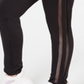Calça jogger feminina Lala Anthony plus size listrada em malha preta tamanho 2X