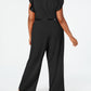 Macacão Calvin Klein Feminino com Cinto, Babados, Zíper, Sem Mangas, Gola Joia, Perna Larga, Preto, Tamanho 14W