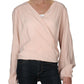 Blusa envolvente drapeada Check on It Hi-Low da Free People para mulheres, rosa, tamanho M