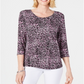 Blusa feminina estampada com manga 3/4 e estampa animal rosa da coleção JM, tamanho pequeno P/M