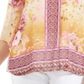 Blusa feminina com estampa floral da coleção JM, tamanho pequeno, amarela