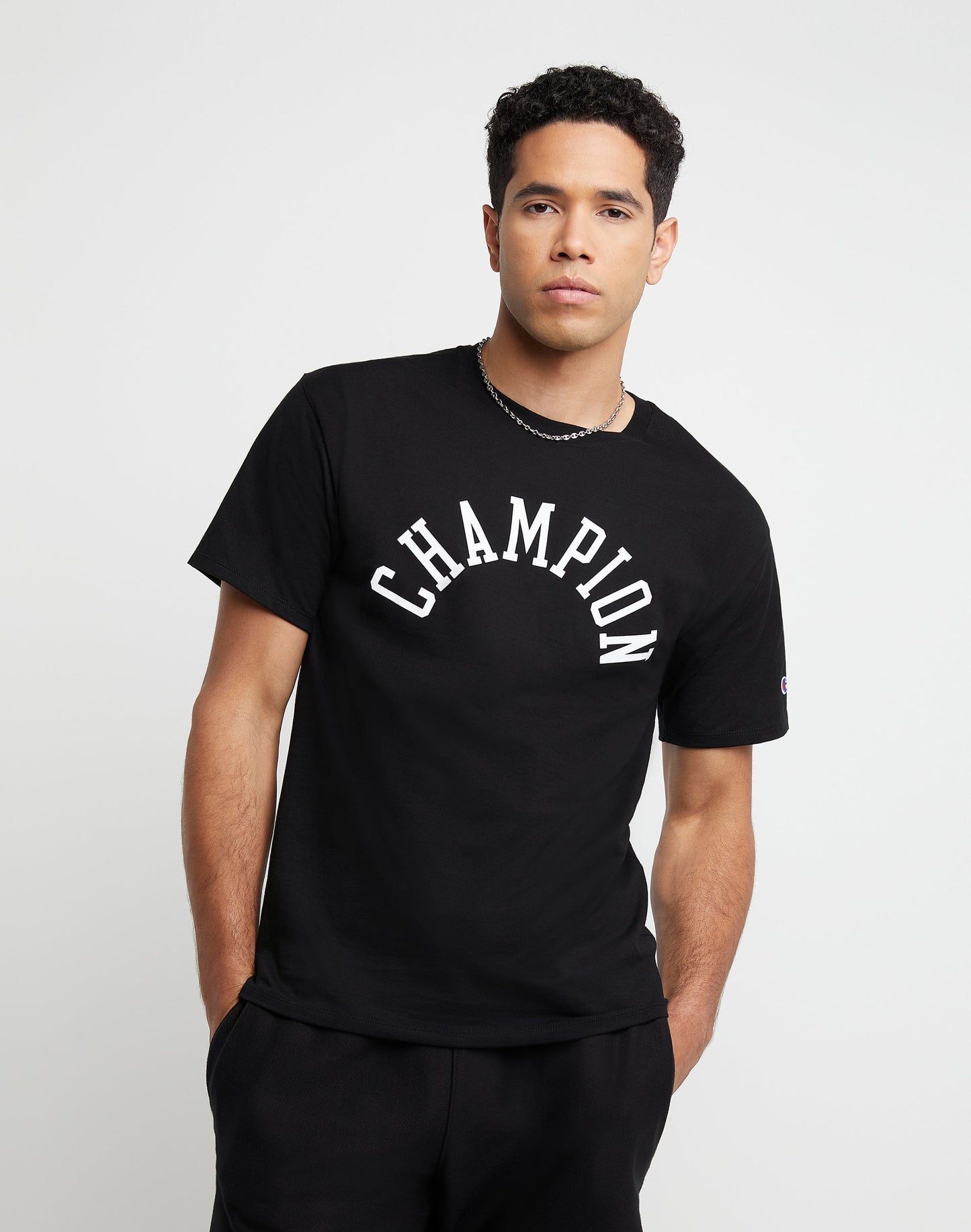 Camiseta masculina Champion com estampa de logotipo e ajuste padrão, preta, tamanho XX-G