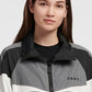 Jaqueta corta-vento feminina DKNY Sport Colorblocked refletiva, preta, tamanho grande