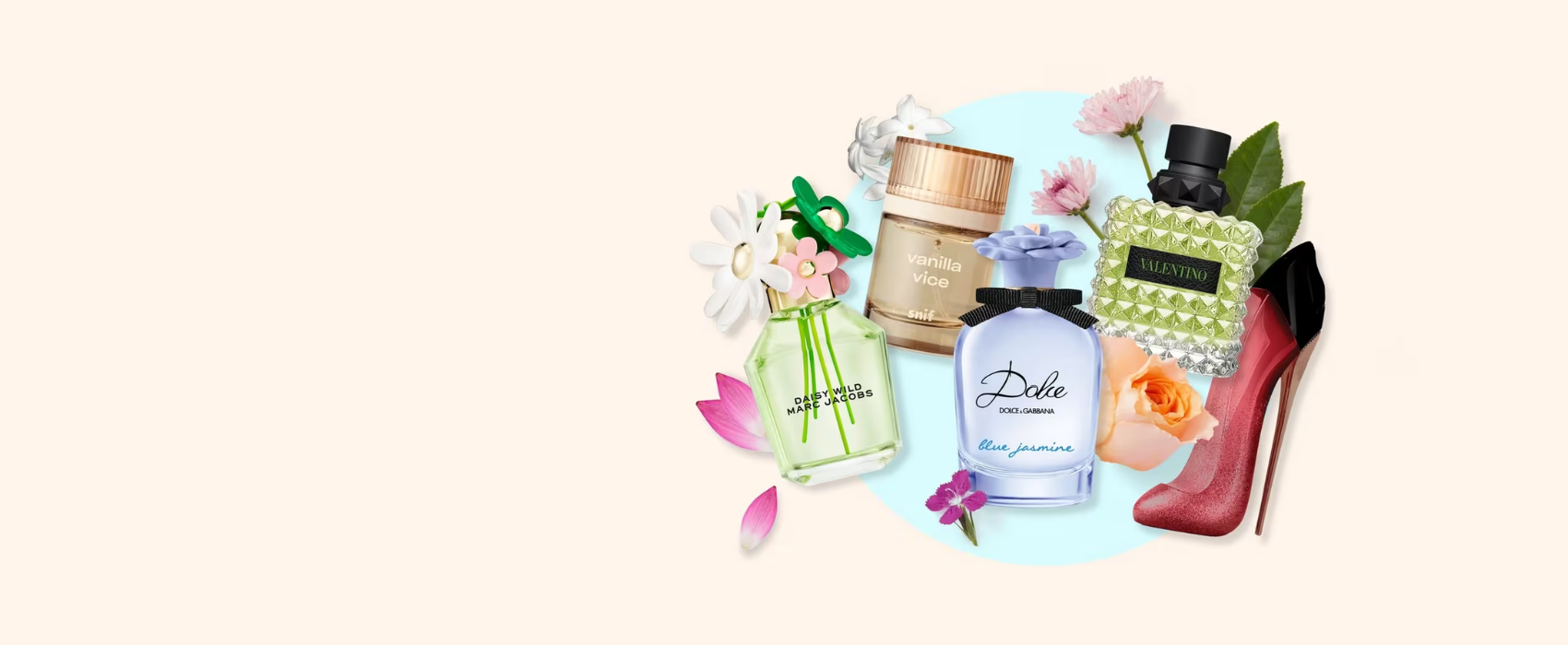 Collection of perfume bottles and a high heel shoe on a white background with flowers.