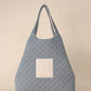 Care Tucker - Bolsa tote jeans acolchoada maxi