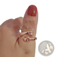 Adjustable Silver Hands Embracing Ring with Red Gemstone