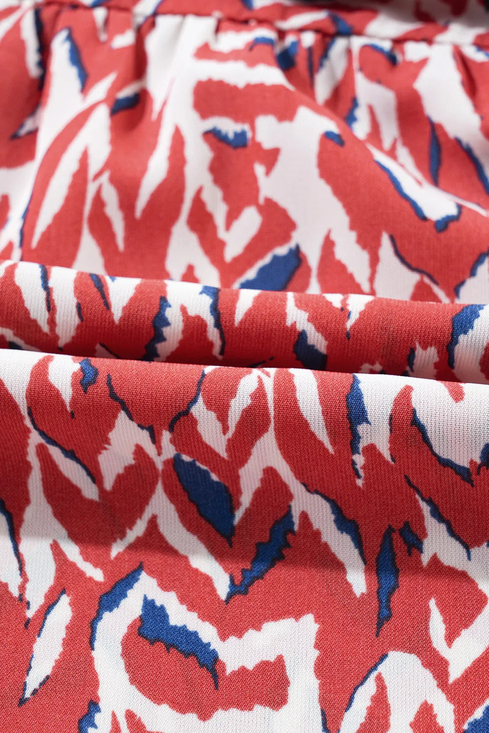 Vestido de manga comprida estampado com entalhe