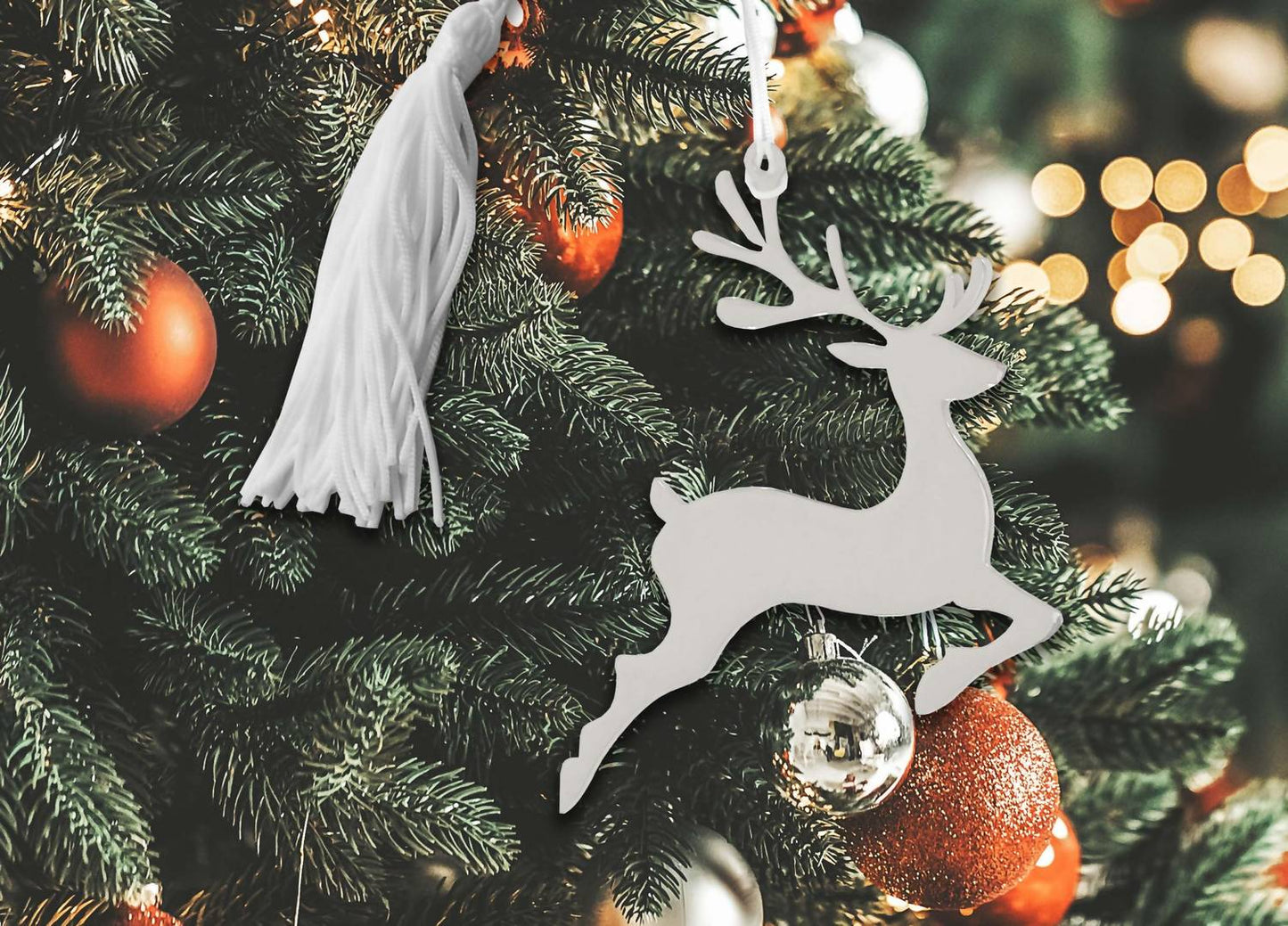 Creative Gifts International - Reindeer Ornament with White Tassel