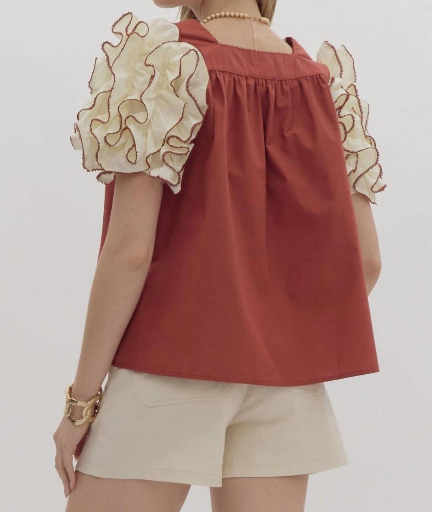 Entro - brick blouse with white ruffle
