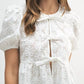 Mable - Eyelet Puff Sleeve Front Tie Peplum Top