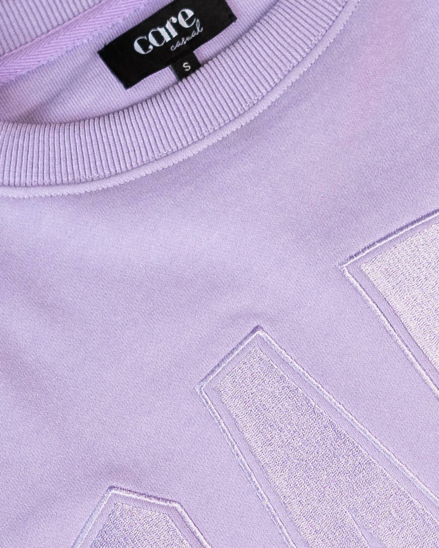 Care Tucker - 90’s Baggy Care Crewneck Sweatshirt