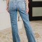 Judy Blue - Mid Rise Boot Cut Jean With Distress Hem
