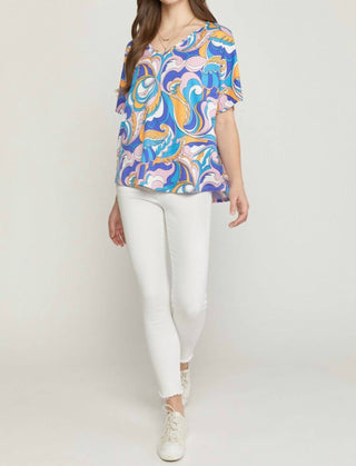 Introdução - Blusa abstrata com decote em V