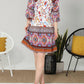 Paparazzi - Border Print Smocked Dress