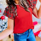 1 The Woman - Plaid Pearl Ruffle Sleeve Top