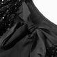Vestido curto de manga comprida com decote redondo e lantejoulas