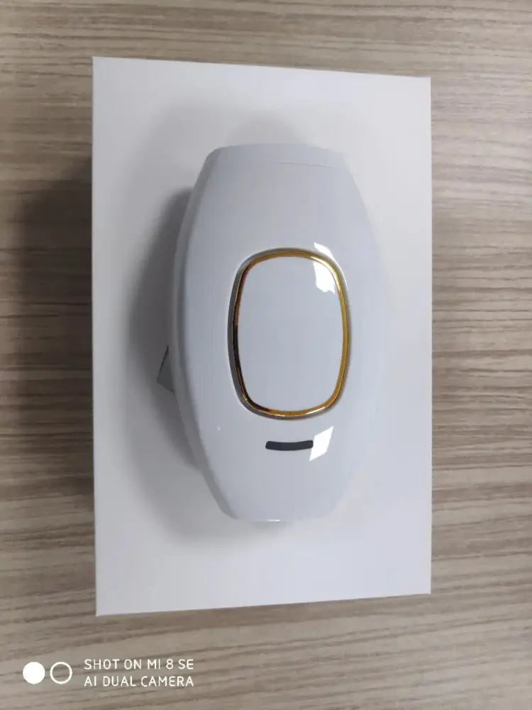 Foldable Ipl Laser Hair Removal Device with Gold Accents