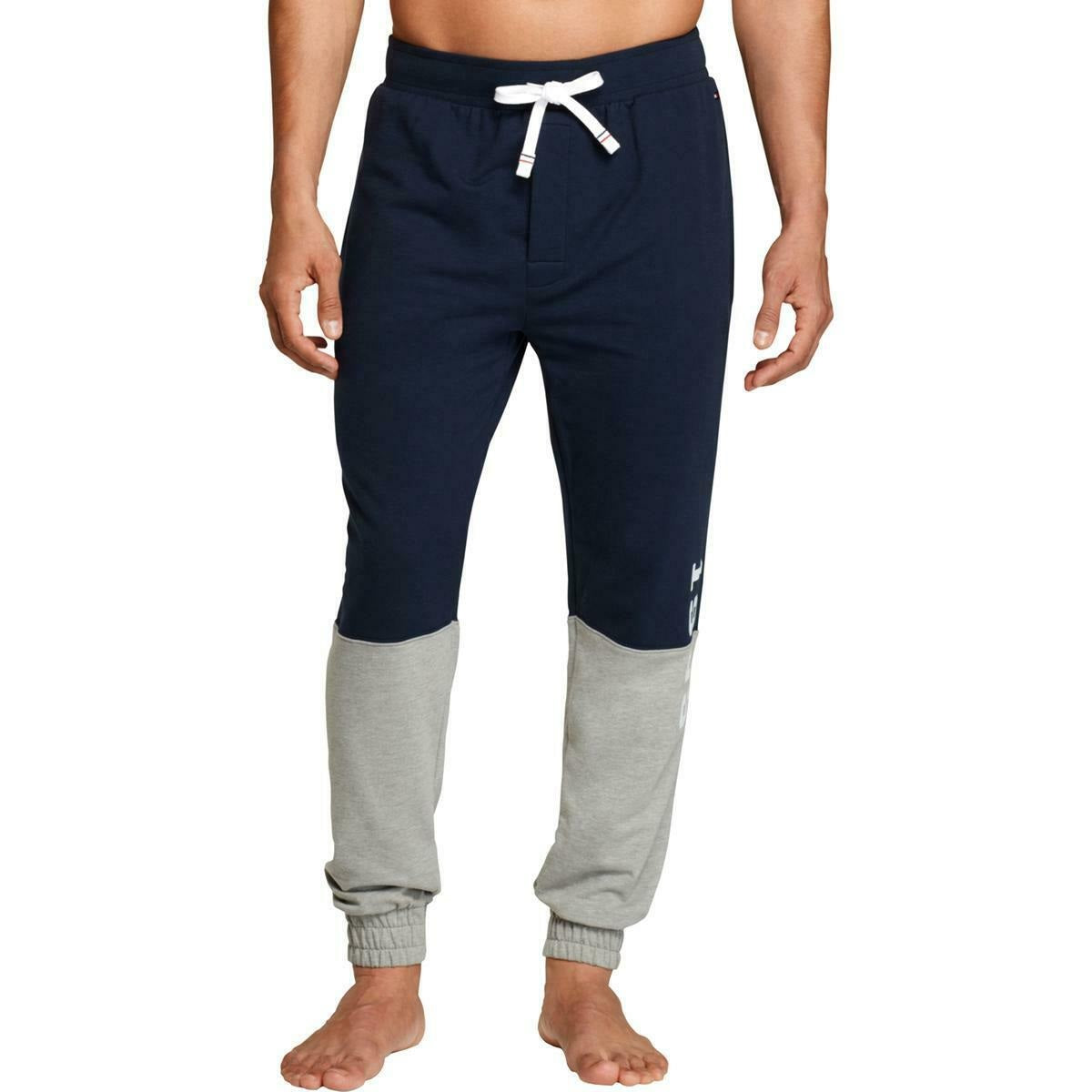 Calça de moletom masculina Tommy Hilfiger com logo colorido e bloco de cores, tamanho azul-marinho, tamanho extra grande