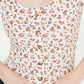 Blusa floral com botões frontais Hippie Rose Junior, preta, tamanho X-S