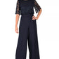 Macacão feminino Donna Ricco com sobreposição de renda e pernas largas, azul-marinho, tamanho 16 plus