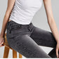 E agora esta blusa feminina sem mangas com decote falso e franzido lateral, branca, tamanho médio