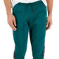 Calça de moletom masculina Michael Kors Slim Fit com logo e fita verde, tamanho médio