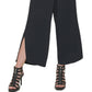 Calça feminina DKNY com bainha dividida e perna larga, preta