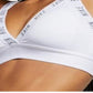 Sutiã esportivo Nike Indy feminino com costas abertas e baixo impacto, branco, tamanho extrapequeno