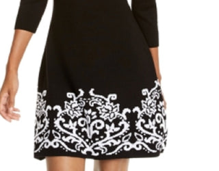 Vestido suéter infantil com estampa de corações e lantejoulas, preto, tamanho pequeno