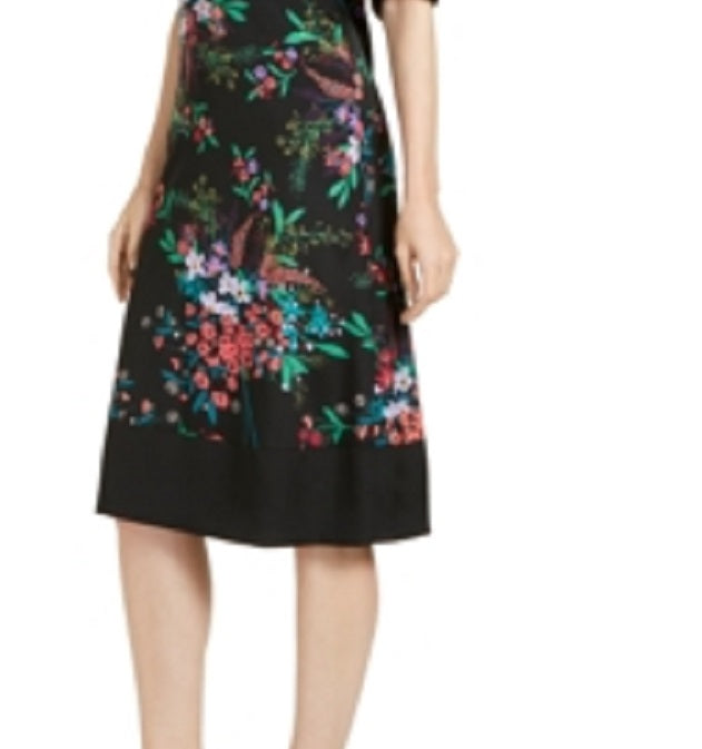 Vestido feminino Trina Turk com estampa floral, manga 3/4, decote em V abaixo do joelho, ajuste flare, preto, tamanho 14