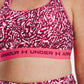 Sutiã esportivo Under Armour HeatGear feminino com estampa cruzada nas costas, tamanho médio, roxo