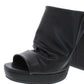 Mulas largas Madden Girl Lambie de couro sintético femininas, pretas, tamanho 9